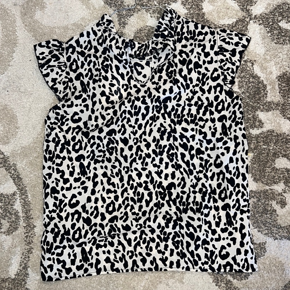cheetah print blouse with ruffle sleeves in size small from branded royalty!